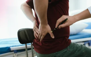 A person standing with perfect spinal alignment outdoors